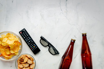 watching movies concept with chips on white background top view mock-up