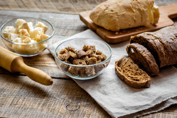 Sliced rye bread on wooden table background