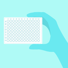 hand holding pcr plate