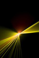 Laser beam yellow on a black background