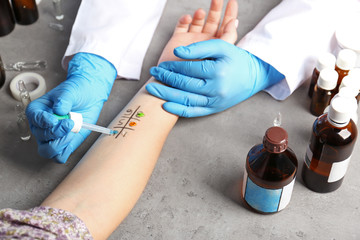 Doctor making allergy test in laboratory