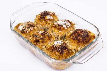 Fish meatballs in glass form on white background