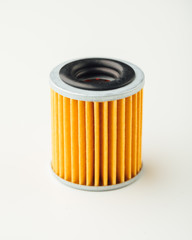 oil filter part for car, white background