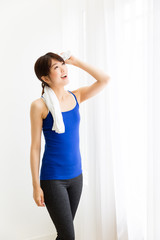 sporty asian woman relaxing