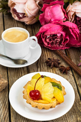 Cake with cream and fruit in jelly