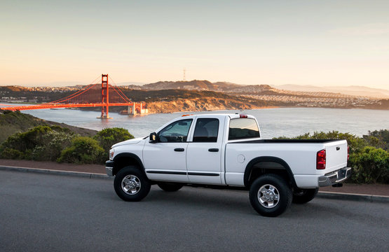 White Truck in front of the Golden Gate Bridge