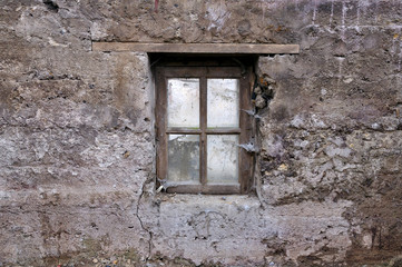 Wall with wooden window