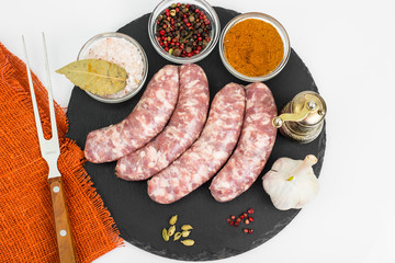 Raw homemade sausage with spices