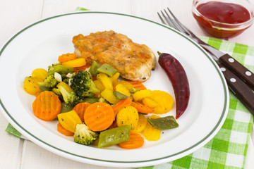 Chopped chicken with vegetable garnish