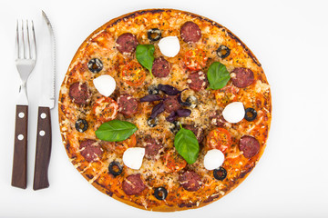 Pizza with salami and tomatoes