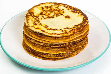 Thin fragrant pancakes on white background