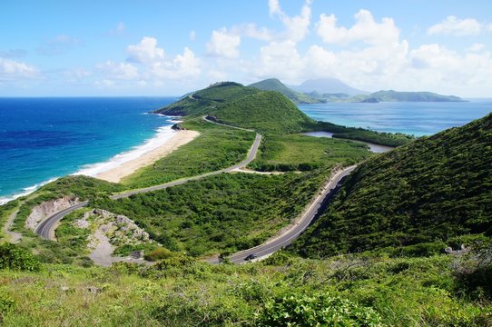 Scenic view from elevated overlook towards St. Kitts isthmus and Nevis Island, St. Kitts.