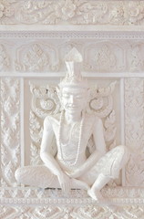 Fototapeta na wymiar High Relief Sculpture of Ascetic or Hermit in India and Southeast Asia Folklore in Thai Buddhism Myth, Ampawa, Thailand
