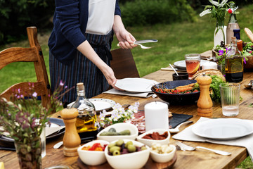 Woman Preparing Table Dinner Concept
