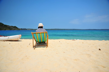 Woman Relaxing on Summer Beach 