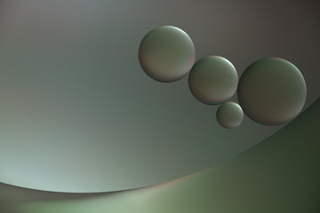 drops of oil and air bubbles on the water