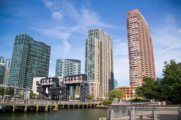 Pier at Gantry Plaza State Park and buildings with blue sky, New York