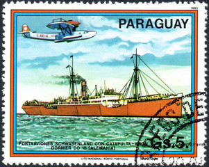 UKRAINE - CIRCA 2017: A postage stamp printed in Paraguai shows Germany aircraft carrier, from the series Carriers and Airplanes, circa 1983