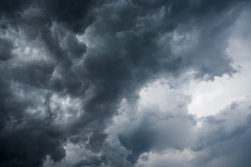 Background of dark clouds before a thunder-storm
,sunlight through very dark clouds background
,White Hole in the Whirlwind of dark storm clouds