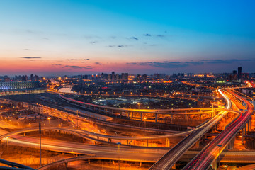 Fototapeta na wymiar panoramic view of Shanghai overpass,road intersection at night in China.