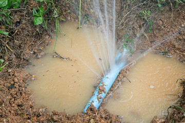 Water pipe break,  leaking from hole in a hose,selective focus - Powered by Adobe