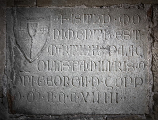 Engraved stone with latin letters