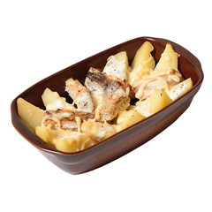 Delicious casserole with pieces of pork, baked potato, cheese and  sauce.  Isolated on the white background