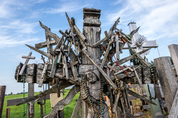 Fototapeta na wymiar Close up on croos on pilgrimage site called Hill of Crosses, Lithuania