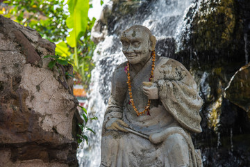 Fototapeta na wymiar Statue of physical therapy gesture in Wat Pho, Bangkok, Thailand