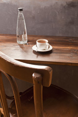 Espresso cup on the wooden desk.