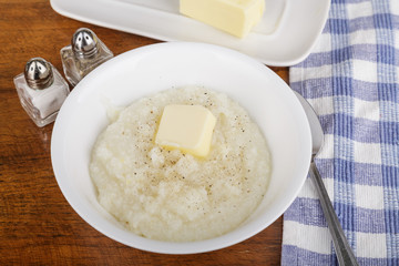 Bowl of Grits with Butter and Pepper