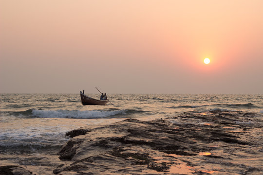 Indian sea sanset and ship