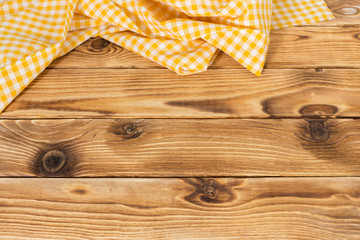 Background with empty wooden table with tablecloth