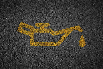 Oil change on asphalt