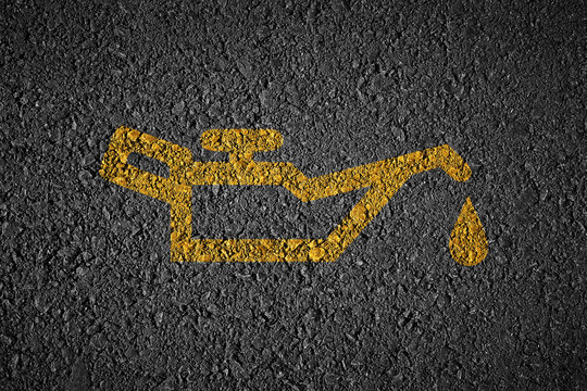 Oil change on asphalt