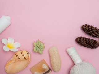 Aromatherapy  product  Spa set ,candle ,soap,coconut,flower,shell,  massage  with  pink color   background .