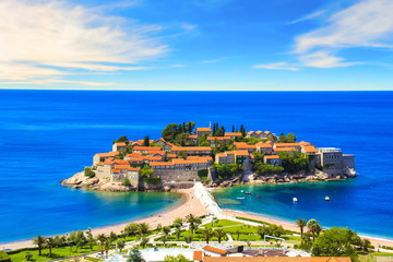 Beautiful view of the island-resort of St. Stefan (Sveti Stefan) on the Budva Riviera, Budva, Montenegro on a sunny day