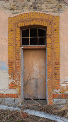 Part of the old building with door.