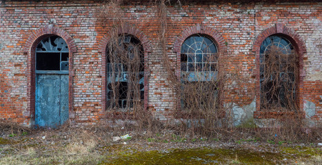 Fototapeta na wymiar Part of building with door and windows.