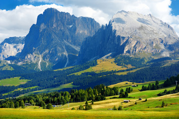 Seiser Alm, the largest high altitude Alpine meadow in Europe, stunning rocky mountains on the background.