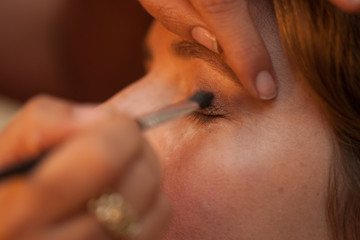 Applying make up on the eyes