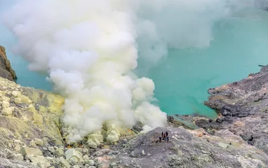 Fotobehang View at the caldera Kawah Ijen volcano and sulphur lake near Bondowoso, Baluran National Park - Jawa island, Indonesia © vadim_petrakov