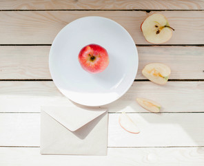 Apple cut into slices on a plate