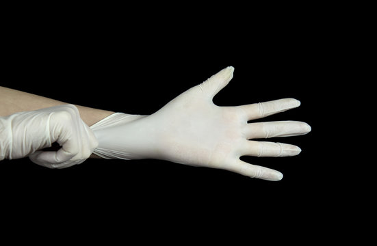 hand with white Glove on black