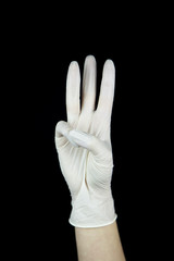 hand with white Glove on black