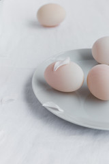 Duck Eggs on Plate with Petals 