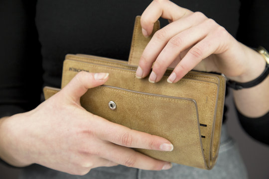 woman holding wallet