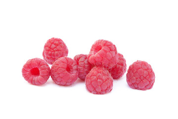 Fresh ripe raspberries isolated on white background