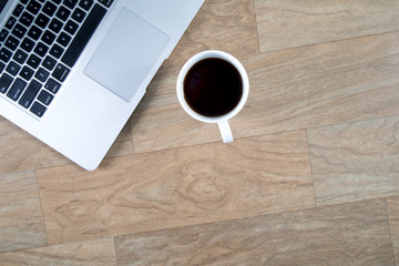 Laptop on wooden desk