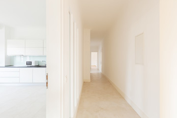 White empty corridor with room